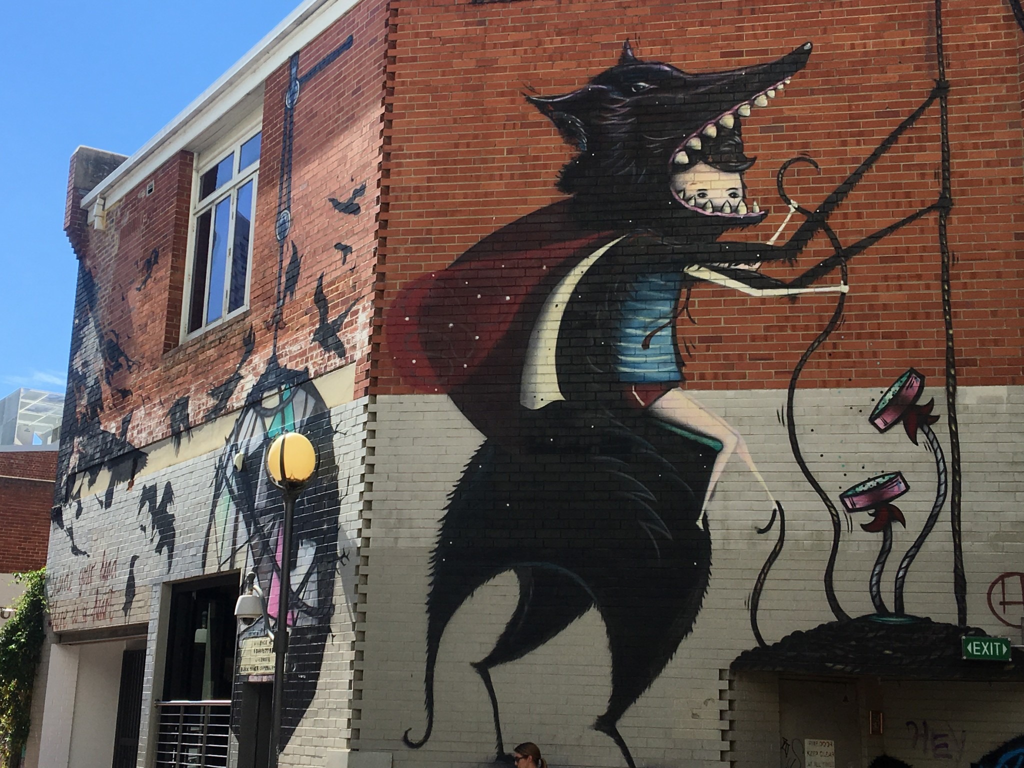 mural of a boy dressed in wolf's clothing