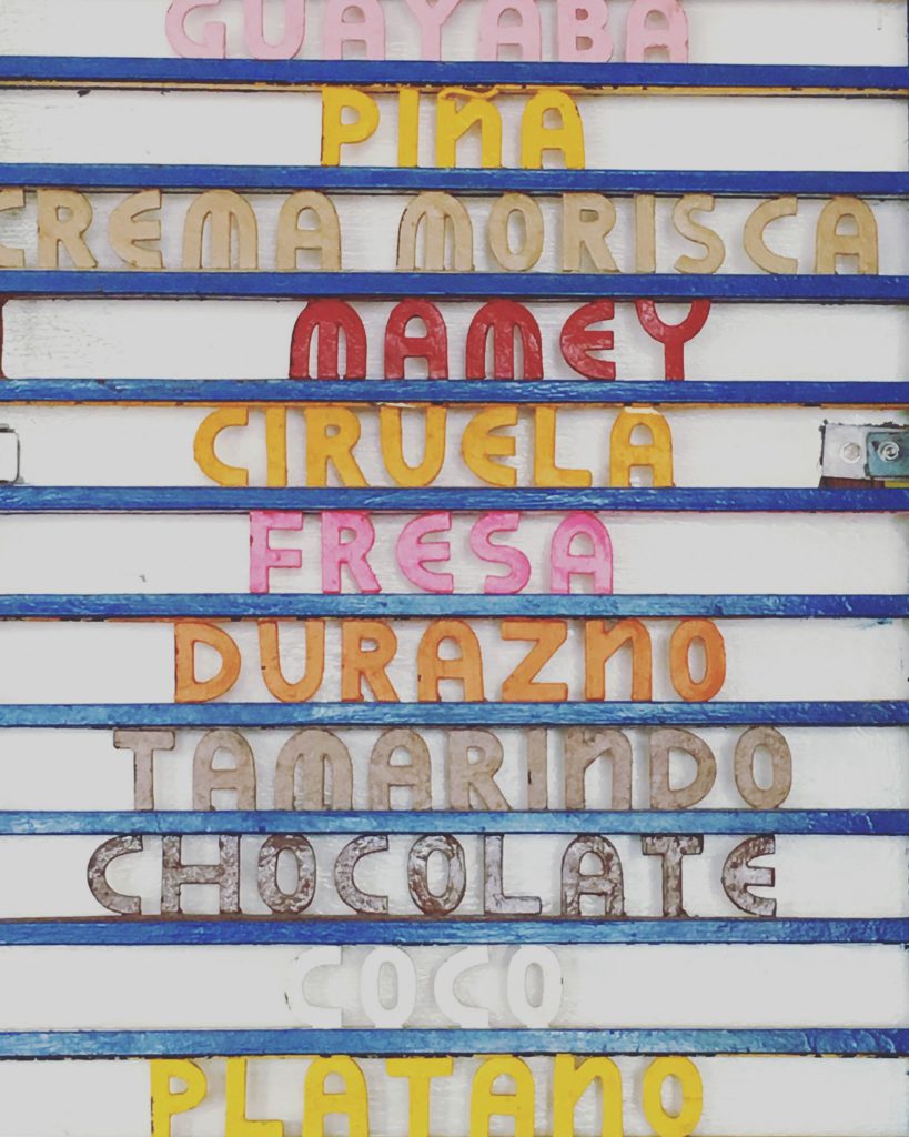list of flavours at an ice cream shop in Merida