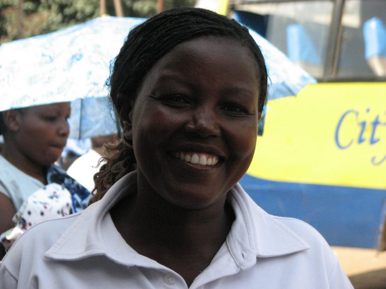 woman smiling at the camera in Nairobi