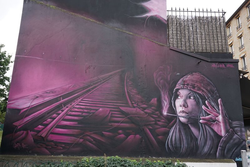 street art of train tracks in Paris